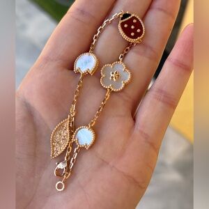 Elegant Gold and White Floral Charm Bracelet